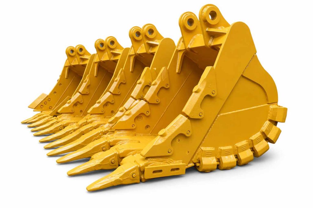 Heavy-duty excavator buckets lined up in the factory for size and build comparison